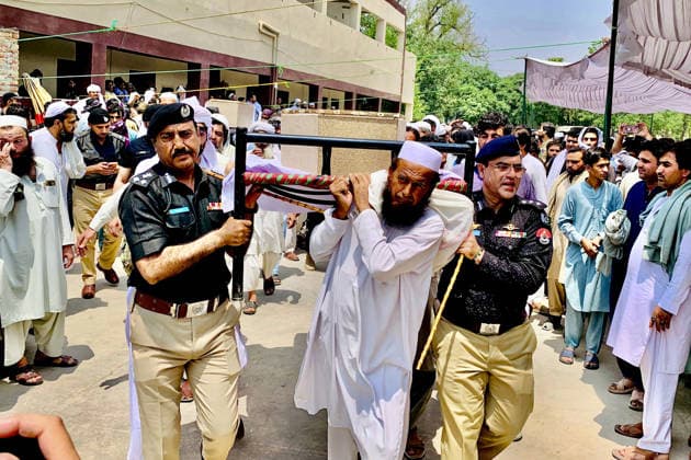 May 10, 2026, Peshawar, Peshawar, Pakistan: Funeral for victims of attack at police station in Pakistan..Relatives and police officials attend the funeral of victims of a car bomb attack at a police post in Bannu, KPK province, Pakistan, 10 May 2026. According to police officials, at least 12 police personnel were killed and several others injured after an explosives-laden vehicle struck the checkpoint, followed by an exchange of fire with militants in the northwestern Bannu district bordering Afghanistan. Peshawar Pakistan  - ZUMAa217 20260510_znp_a217_006 Copyright: xHussainxAlix