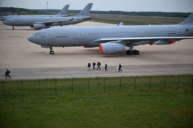 Plane carrying MV Hondius passengers arrives at Eindhoven Airport EINDHOVEN, NETHERLANDS - MAY 10: Passengers walk inside the airport after the plane repatriating 26 Dutch national passengers of the MV Hondius cruise ship, where an outbreak of hantavirus has been detected, lands at Eindhoven Air Base International airport in Eindhoven, Netherlands on May 10, 2026. The World Health Organisation (WHO) has identified six confirmed cases of hantavirus out of eight suspected cases, including three people who have died from this known but rare virus, for which there is neither a vaccine nor a treatment. Mouneb Taim Anadolu Eindhoven Netherlands. Editorial use only. Please get in touch for any other usage.  Copyright: x2026xAnadoluxMounebxTaimx