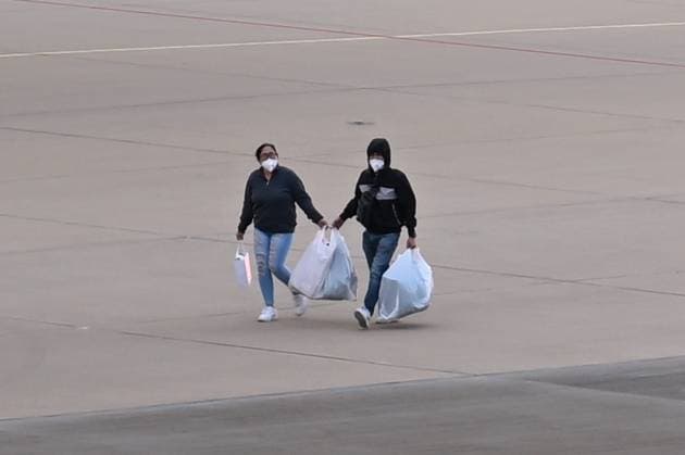 Plane carrying MV Hondius passengers arrives at Eindhoven Airport EINDHOVEN, NETHERLANDS - MAY 10: Passengers walk inside the airport after the plane repatriating 26 Dutch national passengers of the MV Hondius cruise ship, where an outbreak of hantavirus has been detected, lands at Eindhoven Air Base International airport in Eindhoven, Netherlands on May 10, 2026. The World Health Organisation (WHO) has identified six confirmed cases of hantavirus out of eight suspected cases, including three people who have died from this known but rare virus, for which there is neither a vaccine nor a treatment. Mouneb Taim Anadolu Eindhoven Netherlands. Editorial use only. Please get in touch for any other usage.  Copyright: x2026xAnadoluxMounebxTaimx