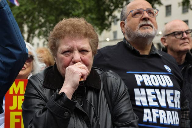 May 10, 2026, London, United Kingdom: Members of the Jewish community and their supporters react during the Standing Strong: Extinguish Antisemitism rally outside Downing Street. The rally follows a wave of recent attacks targeting synagogues and Jewish communities across Britain. Organized by community groups, it calls for solidarity against extremism, stronger policing of hate crimes, and a visible, united stand against antisemitism. The demonstration was organized in response to months of antisemitic violence, including multiple arson attacks targeting Jewish communities and the stabbing of two British Jews in Golders Green on 29 April. London United Kingdom - ZUMAs197 20260510_aaa_s197_331 Copyright: xDinendraxHariax