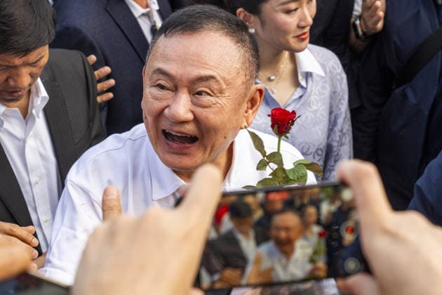 Former Thai Prime Minister Thaksin Shinawatra released on parole BANGKOK, THAILAND - MAY 11: Former Thai Prime Minister Thaksin Shinawatra smiles while greeting supporters after exiting Klong Prem Central Prison on parole in Bangkok, Thailand on May 11, 2026. Shinawatra was convicted on corruption charges in 2023 and sentenced to eight years in prison, later reduced to one year by royal pardon. His case drew renewed controversy after he initially served his sentence almost entirely in a luxury ward at Thailand’s Police General Hospital, leading to his subsequent return to prison. Adryel Talamantes Anadolu Bangkok Thailand. Editorial use only. Please get in touch for any other usage.  Copyright: x2026xAnadoluxAdryelxTalamantesx