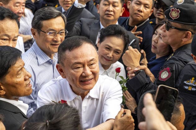 Former Thai Prime Minister Thaksin Shinawatra released on parole BANGKOK, THAILAND - MAY 11: Former Thai Prime Minister Thaksin Shinawatra smiles while greeting supporters after exiting Klong Prem Central Prison on parole in Bangkok, Thailand on May 11, 2026. Shinawatra was convicted on corruption charges in 2023 and sentenced to eight years in prison, later reduced to one year by royal pardon. His case drew renewed controversy after he initially served his sentence almost entirely in a luxury ward at Thailand’s Police General Hospital, leading to his subsequent return to prison. Adryel Talamantes Anadolu Bangkok Thailand. Editorial use only. Please get in touch for any other usage.  Copyright: x2026xAnadoluxAdryelxTalamantesx