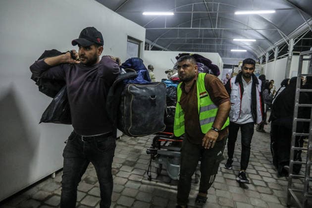 Palestinian patients receiving treatment in Egypt returned to Gaza via the Rafah Border Crossing KHAN YUNIS, GAZA, PALESTINE - MAY 11: Palestinian patients and their companions return to the Gaza Strip from Egypt through the Rafah border crossing in Khan Yunis, Gaza, Palestine on May 11, 2026. The Palestinians, who had been receiving treatment in Egypt, were transported by buses to Nasser Hospital in Khan Yunis in southern Gaza, where they were met with emotional reunions by family members waiting outside the hospital. Abed Rahim Khatib Anadolu Khan Yunis Gaza. Editorial use only. Please get in touch for any other usage.  Copyright: x2026xAnadoluxAbedxRahimxKhatibx