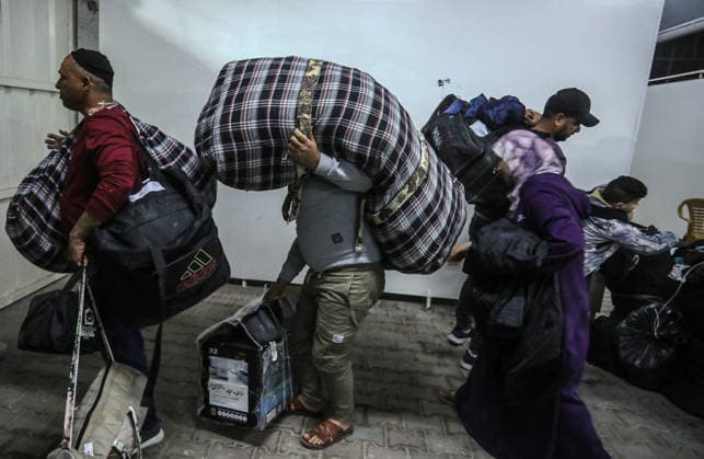 Palestinian patients receiving treatment in Egypt returned to Gaza via the Rafah Border Crossing KHAN YUNIS, GAZA, PALESTINE - MAY 11: Palestinian patients and their companions return to the Gaza Strip from Egypt through the Rafah border crossing in Khan Yunis, Gaza, Palestine on May 11, 2026. The Palestinians, who had been receiving treatment in Egypt, were transported by buses to Nasser Hospital in Khan Yunis in southern Gaza, where they were met with emotional reunions by family members waiting outside the hospital. Abed Rahim Khatib Anadolu Khan Yunis Gaza. Editorial use only. Please get in touch for any other usage.  Copyright: x2026xAnadoluxAbedxRahimxKhatibx
