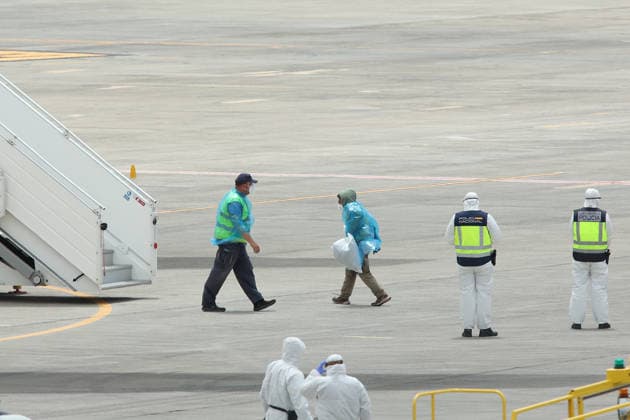 The cruise ship MV Hondius arrives at the port of Granadilla Tenerife National police officers and operators dressed in EPI coveralls and masks coordinate the evacuated travelers of the cruise ship MV Hondius, at the Tenerife South airport, on May 10, 2026, in Tenerife, Canary Islands Spain The evacuation operation of the MV Hondius cruise ship with hantavirus is ready to begin the disembarkation operations and transfer of passengers to their respective countries 10 MAY 2026 HANTAVIRUS PIXELADA Álex Rosa 10 05 2026 Granadilla de Abona, Tenerife, I Granadilla de Abona, Tenerife, I Espana  Copyright: xÃlexxRosax 7512677