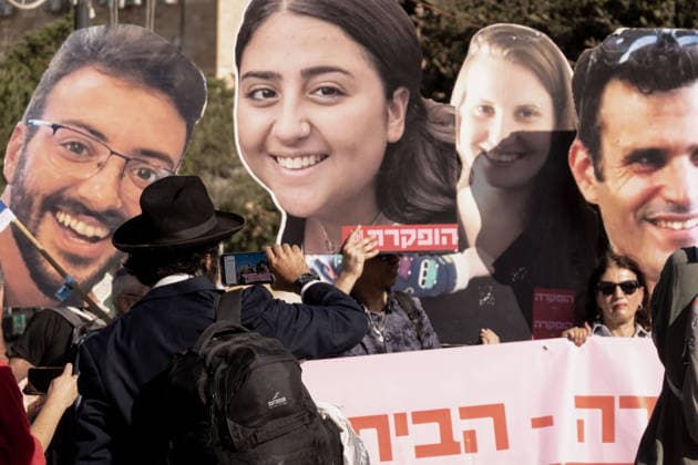 May 11, 2026, Jerusalem, Israel: Protesters gather at the entrance to the Knesset as the Israeli parliament reconvenes after a six week spring recess. Demonstrators hold enlarged placards depicting victims of the October 7, 2023, massacre, which claimed approximately 1,200 lives, and the 46 hostages taken alive and subsequently murdered or found dead in Hamas captivity. The rally demands a judiciary appointed independent national committee of inquiry into government negligence, which protesters claim led to the initial security failure and the deaths of over 1,150 Israeli security personnel in the ensuing battles. With the current governmentÃ¢â‚¬â ¢s mandate potentially lasting until October 2026, the group is calling for immediate accounta - ZUMAa126 20260511_zap_a126_012 Copyright: xNirxAlonx