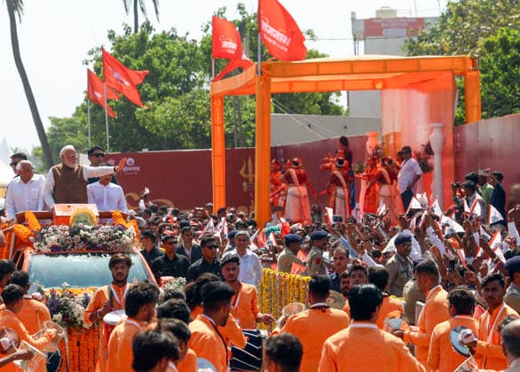 Prime Minister Narendra Modi waves to the crowd during a roadshow on the occasion of Somnath Amrut Mahotsav Gir Somnath, May 11 (ANI): Prime Minister Narendra Modi waves to the crowd during a roadshow on the occasion of Somnath Amrut Mahotsav, celebrating 75 years of the inauguration of the restored Somnath temple, in Gir Somnath on Monday. Gujarat Chief Minister Bhupendra Patel and Deputy Chief Minister Harsh Sanghavi also present. (DPR PMO ANI Photo) Gir Somnath Gujarat India Copyright: xANIx ANI_20260511102