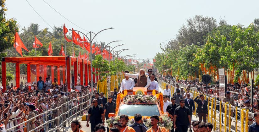 Prime Minister Narendra Modi waves to the crowd during a roadshow on the occasion of Somnath Amrut Mahotsav Gir Somnath, May 11 (ANI): Prime Minister Narendra Modi waves to the crowd during a roadshow on the occasion of Somnath Amrut Mahotsav, celebrating 75 years of the inauguration of the restored Somnath temple, in Gir Somnath on Monday. Gujarat Chief Minister Bhupendra Patel and Deputy Chief Minister Harsh Sanghavi also present. (DPR PMO ANI Photo) Gir Somnath Gujarat India Copyright: xANIx ANI_20260511105