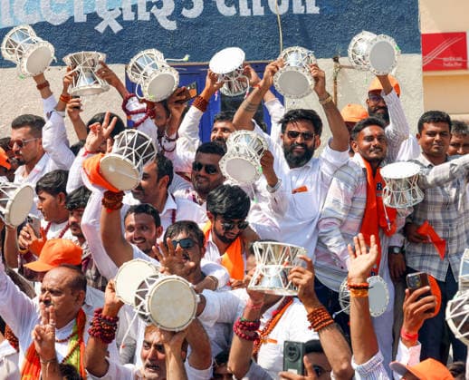 People hold Damru during a roadshow by Prime Minister Narendra Modi Gir Somnath, May 11 (ANI): People hold Damru during a roadshow by Prime Minister Narendra Modi (unseen) on the occasion of Somnath Amrut Mahotsav, celebrating 75 years of the inauguration of the restored Somnath temple, in Gir Somnath on Monday. (DPR PMO ANI Photo) Gir Somnath Gujarat India Copyright: xANIx ANI_20260511116