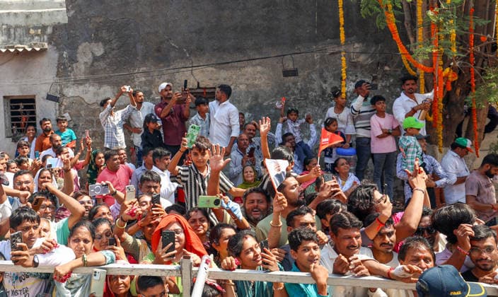 People wave and click pictures during a roadshow by Prime Minister Narendra Modi Gir Somnath, May 11 (ANI): People wave and click pictures during a roadshow by Prime Minister Narendra Modi (unseen) on the occasion of Somnath Amrut Mahotsav, celebrating 75 years of the inauguration of the restored Somnath temple, in Gir Somnath on Monday. (DPR PMO ANI Photo) Gir Somnath Gujarat India Copyright: xANIx ANI_20260511123