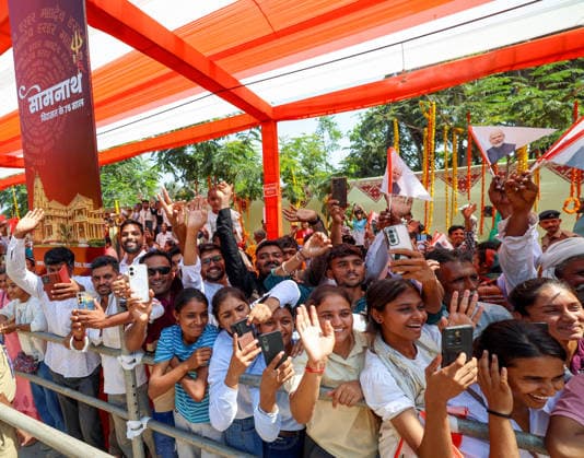 People wave and click pictures during a roadshow by Prime Minister Narendra Modi Gir Somnath, May 11 (ANI): People wave and click pictures during a roadshow by Prime Minister Narendra Modi (unseen) on the occasion of Somnath Amrut Mahotsav, celebrating 75 years of the inauguration of the restored Somnath temple, in Gir Somnath on Monday. (DPR PMO ANI Photo) Gir Somnath Gujarat India Copyright: xANIx ANI_20260511150