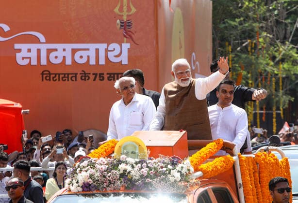Prime Minister Narendra Modi waves to the crowd during a roadshow on the occasion of Somnath Amrut Mahotsav Gir Somnath, May 11 (ANI): Prime Minister Narendra Modi waves to the crowd during a roadshow on the occasion of Somnath Amrut Mahotsav, celebrating 75 years of the inauguration of the restored Somnath temple, in Gir Somnath on Monday. Gujarat Chief Minister Bhupendra Patel and Deputy Chief Minister Harsh Sanghavi also present. Gir Somnath Gujarat India Copyright: xANIx ANI_20260511180