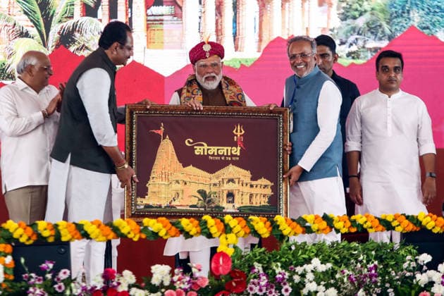 PM Modi Attends Public Meeting in Gir Somnath to Mark 75 Years of Somnath Temple Amrut Mahotsav Gir Somnath, May 11 (ANI): Prime Minister Narendra Modi being presented with a momento from Somnath temple members during a public meeting, celebrating 75 years of the Somnath Temple Amrut Mahotsav, in Gir Somnath on Monday. chief Minister of Gujarat Bhupendra patel and Deputy Chief Minister of Gujarat Harsh Sanghvi also present. Gir Somnath Gujarat India Copyright: xANIx ANI_20260511237