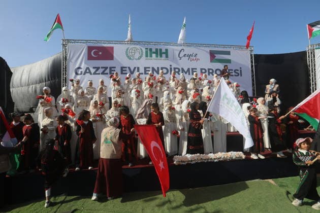 Mass wedding held for Palestinian couples in Gaza City Palestinians take part in a mass wedding ceremony for Palestinian brides and grooms organized by the Turkish Humanitarian Relief Foundation (IHH) in Gaza City on May 11, 2026. The mass wedding was held as part of a humanitarian initiative aimed at supporting 50 grooms who are sons of Palestinians killed during the war, amid difficult humanitarian and economic conditions in the Gaza Strip. Photo by Bilal Osama apaimages Gaza city Gaza Strip Palestinian Territory 110526_Gaza_BO_02(59) Copyright: xapaimagesxBilalxOsamax xapaimagesx