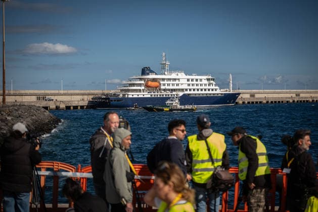 Passengers disembark from MV Hondius at Granadilla Port in Spain TENERIFE, SPAIN - MAY 11: MV Hondius docks at the pier after adverse weather conditions prevented the safe disembarkation of passengers while anchored at Granadilla Port in Tenerife, Canary Islands, Spain on May 11, 2026. Andres Gutierrez Anadolu Tenerife Spain. Editorial use only. Please get in touch for any other usage.  Copyright: x2026xAnadoluxAndresxGutierrezx