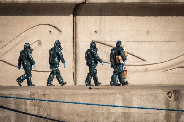 Passengers disembark from MV Hondius at Granadilla Port in Spain TENERIFE, SPAIN - MAY 11: Officers from the Guardia Civil wearing CBRN protective suits approach the MV Hondius to assist with the disembarkation of the remaining passengers at Granadilla Port in Tenerife, Canary Islands, Spain on May 11, 2026. Andres Gutierrez Anadolu Tenerife Spain. Editorial use only. Please get in touch for any other usage.  Copyright: x2026xAnadoluxAndresxGutierrezx