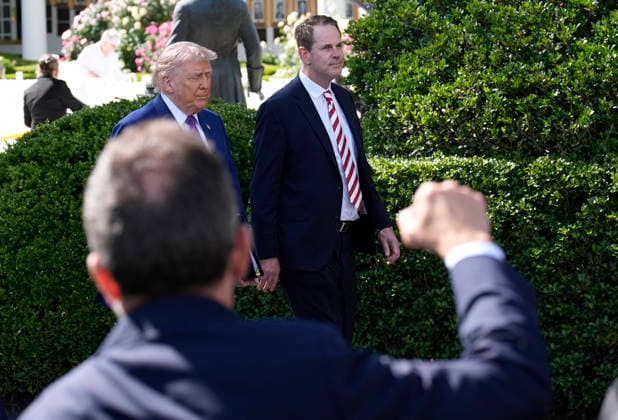 Donald Trump hosts Indiana University Football Champions - Washington US President Donald Trump and Indiana University head football Coach Curt Cignetti arrive for a ceremony on the south lawn on May 11, 2026 in Washington, DC. Photo by Yuri Gripas ABACAPRESS.COM Washington DC United States  Copyright: xPool ABACAx
