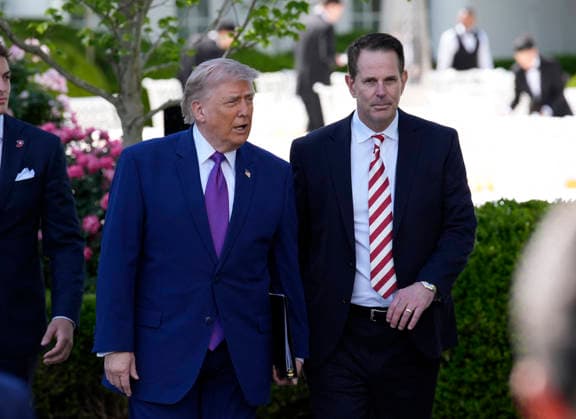 Donald Trump hosts Indiana University Football Champions - Washington US President Donald Trump and Indiana University head football Coach Curt Cignetti arrive for a ceremony on the south lawn on May 11, 2026 in Washington, DC. Photo by Yuri Gripas ABACAPRESS.COM Washington DC United States  Copyright: xPool ABACAx