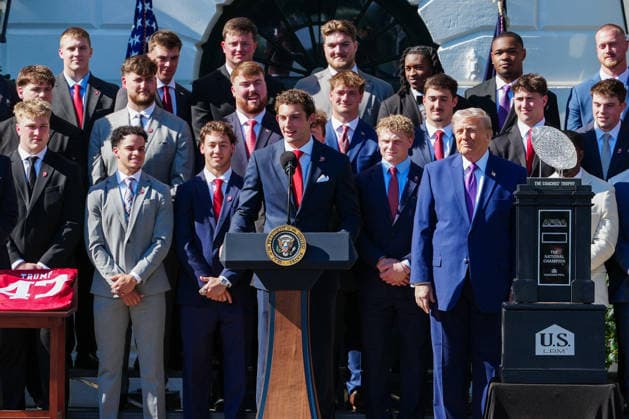 DC: President Trump hosts 2026 National Football Champions Indiana University Indiana wide receiver Charlie Becker speaks as President Donald Trump looks on during an event hosting the 2026 National Football Champions Indiana University on the South Lawn of The White House in Washington D.C., on Monday, May 11, 2026. (Photo by Aaron Schwartz Pool ABACAPRESS.COM) Washington District of Columbia United States  Copyright: xPool ABACAx
