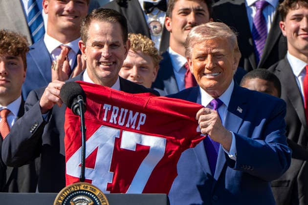 Indiana Coach Curt Cignetti gives President Donald Trump a jersey during an event welcoming the 2026 College Football National Champions from Indiana University to the White House during a ceremony on the South Lawn in Washington, DC on Monday, May 11, 2026.  WAP20260511315 BONNIExCASH