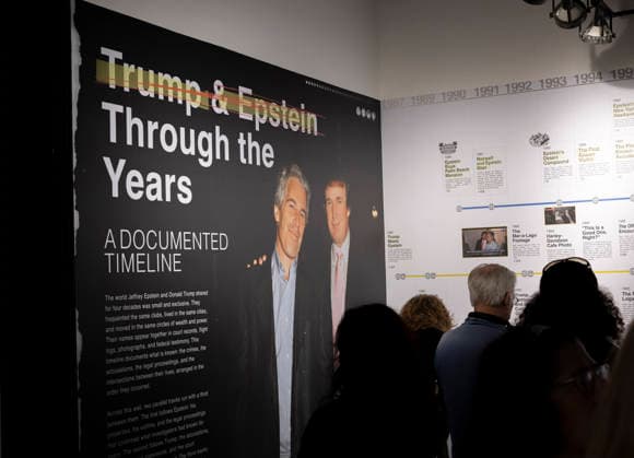 May 11, 2026, New York, New York, USA: People read a timeline titled Trump and Epstein Through the Years A DOCUMENTED TIMELINE at The Donald J. Trump and Jeffrey Epstein Memorial Reading Room which holds 3,437 volumes of the released and partially redacted Epstein files. Visitors may access the Tribeca, Manhattan installation by appointment. Organizers state that the intention of The Reading Room is to keep public attention on the crimes of Epstein and the Epstein class, challenge the Trump administrationÃ¢â‚¬â ¢s attempts to bury them, and to support survivors as they seek justice. Resources for sexual assault survivors are available on site as are information about contacting the Department of Justice, a place to share reflections and - ZUMAr174 20260511_znp_r174_018 Copyright: xGinaxMxRandazzox