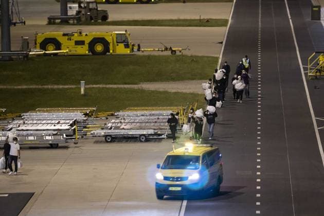 Planes carrying passengers and crew from Hantavirus-hit cruise ship land at Eindhoven Airport EINDHOVEN, NETHERLANDS - MAY 11: Personnel wearing hazmat suits are seen near one of the two planes carrying passengers and crew members from the Hantavirus-affected MV Hondius cruise ship after landing at Eindhoven Airport in Eindhoven, Netherlands on May 11, 2026. Nikos Oikonomou Anadolu Eindhoven Netherlands. Editorial use only. Please get in touch for any other usage.  Copyright: x2026xAnadoluxNikosxOikonomoux