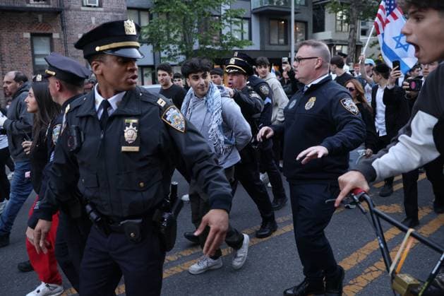 Rally against Israeli real state event in Brooklyn NEW YORK, UNITED STATES - MAY 11: NYPD officers arrest a counter protestor for throwing eggs at a Pro-Palestinian rally during a protest against an Israeli real state event at Young Israel Synagogue of Midwood, Brooklyn, U.S., May 11, 2026. Mostafa Bassim Anadolu New York United States. Editorial use only. Please get in touch for any other usage.  Copyright: x2026xAnadoluxMostafaxBassimx