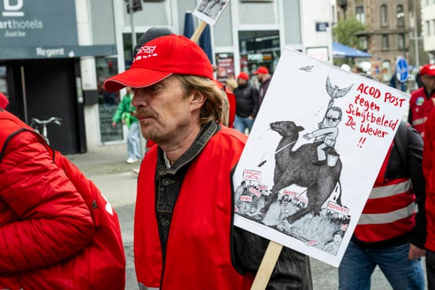 May 12, 2026, Brussels, Brussels, Belgium: For the sixth time since 2025, the three major labour unions have managed to rally their members for a national strike and demonstration. Together with various organisations from different sectors, they have brought 50,000 people onto the streets of Brussels today..The protesters are angry about the reforms of Bart De Weverâ€⠢s federal government. Minister Jan Jambonâ€⠢s pension plans, in particular, are causing a great deal of anger. Various protesters spoke to us: â€oeWe feel robbed.â€Â..The demonstration also passed the American Embassy, where a striking number of people voiced their dissatisfaction with Trump and the US Ambassador to Belgium. ..The offices of the French-speakin - ZUMAr234 20260512_zip_r234_007 Copyright: xBobxReijndersx