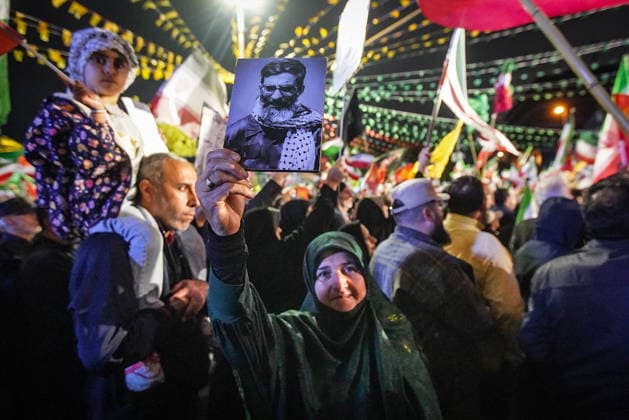 May 12, 2026, Iran, Iran: A Pro-government supporter holds a picture of the late Supreme Leader Ayatollah Ali Khamenei during a state-organized rally, amid a ceasefire in the conflict involving Iran, the United States, and Israel. The United States and Israel launched strikes against Iran on February 28, killing IranÃ¢â‚¬â ¢s supreme leader and top military leaders, prompting Iranian authorities to retaliate with strikes on Israel and across the Gulf, while U.S. President Donald Trump recently described the ceasefire agreement with Iran as being in a Ã¢â‚¬oevery weakÃ¢â‚¬Â state and the spokesman for the Iranian parliamentÃ¢â‚¬â ¢s national security commission warned the United States on May 10 against any attacks on vessels in Gulf waters - ZUMAi98_ 20260512_zih_i98_012 Copyright: xIranianxSupremexLeader SxOfficex