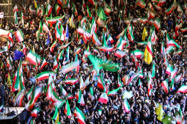 May 12, 2026, Tehran, Iran: Pro-government supporters wave national flags during a state-organized rally, amid a ceasefire in the conflict involving Iran, the United States, and Israel. The United States and Israel launched strikes against Iran on February 28, killing Iranâ€⠢s supreme leader and top military leaders, prompting Iranian authorities to retaliate with strikes on Israel and across the Gulf, while U.S. President Donald Trump recently described the ceasefire agreement with Iran as being in a â€oevery weak†state and the spokesman for the Iranian parliamentâ€⠢s national security commission warned the United States on May 10 against any attacks on vessels in Gulf waters, saying Iranâ€⠢s restraint was over. T - ZUMAi98_ 20260512_zih_i98_017 Copyright: xIranianxSupremexLeader SxOfficex