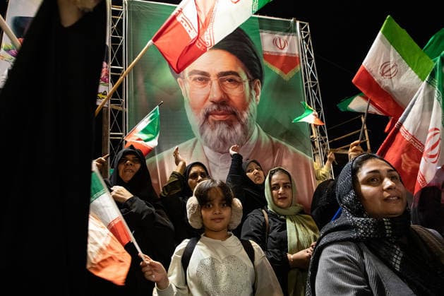 May 12, 2026, Iran, Iran: Pro-government supporters wave national flags in front of a huge picture of Iran s newly appointed Supreme Leader, Ayatollah Mojtaba Khamenei, during a state-organized rally, amid a ceasefire in the conflict involving Iran, the United States, and Israel. The United States and Israel launched strikes against Iran on February 28, killing Iranâ€⠢s supreme leader and top military leaders, prompting Iranian authorities to retaliate with strikes on Israel and across the Gulf, while U.S. President Donald Trump recently described the ceasefire agreement with Iran as being in a â€oevery weak†state and the spokesman for the Iranian parliamentâ€⠢s national security commission warned the United States on Ma - ZUMAi98_ 20260512_zih_i98_019 Copyright: xIranianxSupremexLeader SxOfficex