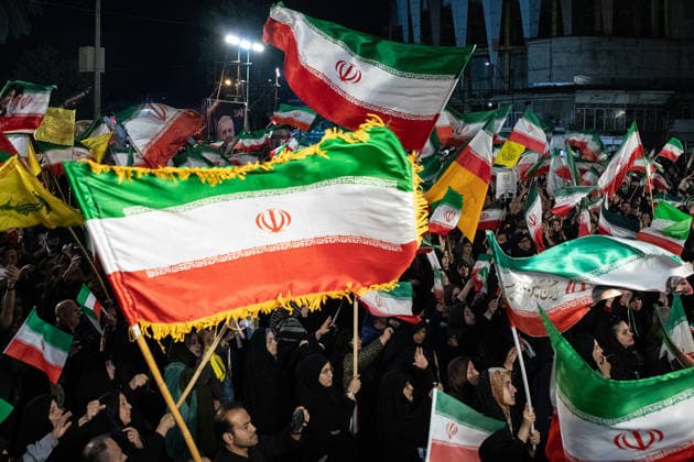 May 12, 2026, Iran, Iran: Pro-government supporters wave national flags during a state-organized rally, amid a ceasefire in the conflict involving Iran, the United States, and Israel. The United States and Israel launched strikes against Iran on February 28, killing Iranâ€⠢s supreme leader and top military leaders, prompting Iranian authorities to retaliate with strikes on Israel and across the Gulf, while U.S. President Donald Trump recently described the ceasefire agreement with Iran as being in a â€oevery weak†state and the spokesman for the Iranian parliamentâ€⠢s national security commission warned the United States on May 10 against any attacks on vessels in Gulf waters, saying Iranâ€⠢s restraint was over. Ira - ZUMAi98_ 20260512_zih_i98_020 Copyright: xIranianxSupremexLeader SxOfficex