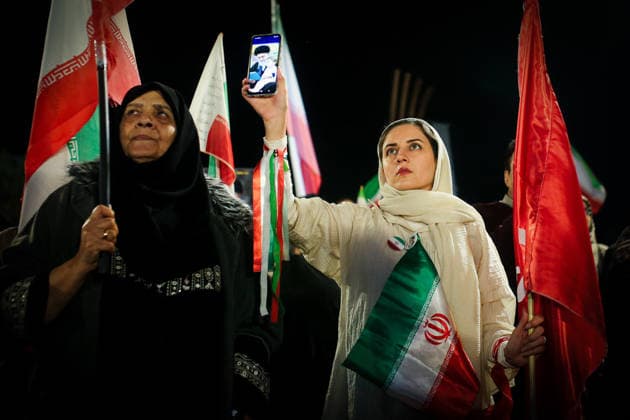 May 12, 2026, Iran, Iran: Pro-government supporters wave national flags during a state-organized rally, amid a ceasefire in the conflict involving Iran, the United States, and Israel. The United States and Israel launched strikes against Iran on February 28, killing Iranâ€⠢s supreme leader and top military leaders, prompting Iranian authorities to retaliate with strikes on Israel and across the Gulf, while U.S. President Donald Trump recently described the ceasefire agreement with Iran as being in a â€oevery weak†state and the spokesman for the Iranian parliamentâ€⠢s national security commission warned the United States on May 10 against any attacks on vessels in Gulf waters, saying Iranâ€⠢s restraint was over. Ira - ZUMAi98_ 20260512_zih_i98_024 Copyright: xIranianxSupremexLeader SxOfficex