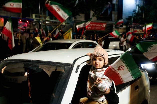 May 12, 2026, Iran, Iran: Pro-government supporters wave national flags during a state-organized rally, amid a ceasefire in the conflict involving Iran, the United States, and Israel. The United States and Israel launched strikes against Iran on February 28, killing Iranâ€⠢s supreme leader and top military leaders, prompting Iranian authorities to retaliate with strikes on Israel and across the Gulf, while U.S. President Donald Trump recently described the ceasefire agreement with Iran as being in a â€oevery weak†state and the spokesman for the Iranian parliamentâ€⠢s national security commission warned the United States on May 10 against any attacks on vessels in Gulf waters, saying Iranâ€⠢s restraint was over. Ira - ZUMAi98_ 20260512_zih_i98_025 Copyright: xIranianxSupremexLeader SxOfficex