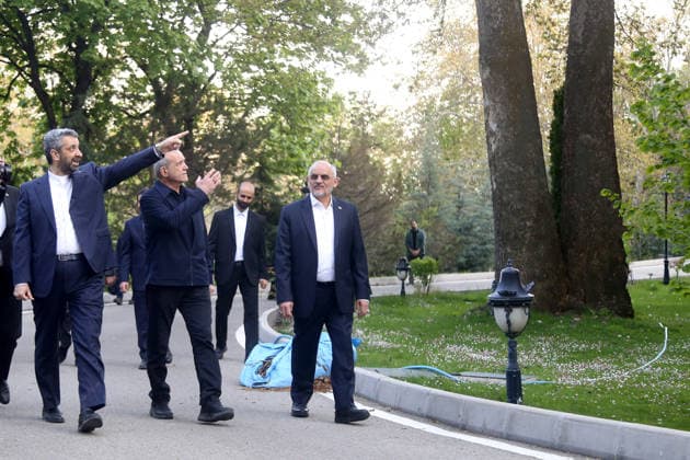 May 12, 2026, Tehran, Iran: Iranian President MASOUD PEZESHKIAN visits the damaged interiors of the Sa dabad Cultural and Historical Complex in Tehran. Since the start of the war, a senior Tehran cultural official said US and Israeli strikes have damaged at least 120 museums and cultural and historic sites nationwide. The Sa dabad Complex is an 80-hectare complex built by the Qajar and Pahlavi monarchs, located in Shemiran, Greater Tehran, Iran. Today, the official residence of the President of Iran is located adjacent to the complex. The complex includes natural forest, streets, qanats, galleries, mansions palaces, and museums. Tehran Iran - ZUMAi98_ 20260512_zih_i98_042 Copyright: xIranianxPresidencyx
