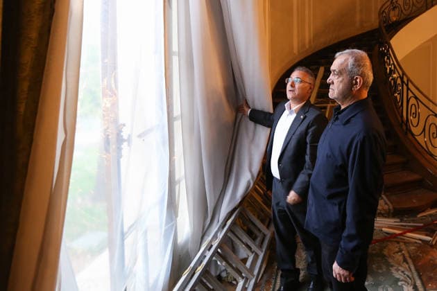 May 12, 2026, Tehran, Iran: Iranian President MASOUD PEZESHKIAN visits the damaged interiors of the Sa dabad Cultural and Historical Complex in Tehran. Since the start of the war, a senior Tehran cultural official said US and Israeli strikes have damaged at least 120 museums and cultural and historic sites nationwide. The Sa dabad Complex is an 80-hectare complex built by the Qajar and Pahlavi monarchs, located in Shemiran, Greater Tehran, Iran. Today, the official residence of the President of Iran is located adjacent to the complex. The complex includes natural forest, streets, qanats, galleries, mansions palaces, and museums. Tehran Iran - ZUMAi98_ 20260512_zih_i98_047 Copyright: xIranianxPresidencyx