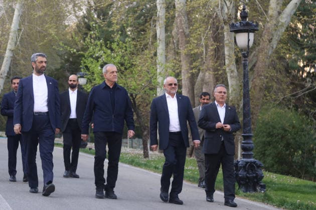 May 12, 2026, Tehran, Iran: Iranian President MASOUD PEZESHKIAN visits the damaged interiors of the Sa dabad Cultural and Historical Complex in Tehran. Since the start of the war, a senior Tehran cultural official said US and Israeli strikes have damaged at least 120 museums and cultural and historic sites nationwide. The Sa dabad Complex is an 80-hectare complex built by the Qajar and Pahlavi monarchs, located in Shemiran, Greater Tehran, Iran. Today, the official residence of the President of Iran is located adjacent to the complex. The complex includes natural forest, streets, qanats, galleries, mansions palaces, and museums. Tehran Iran - ZUMAi98_ 20260512_zih_i98_045 Copyright: xIranianxPresidencyx