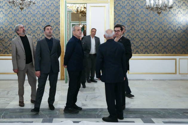 May 12, 2026, Tehran, Iran: Iranian President MASOUD PEZESHKIAN visits the damaged interiors of the Sa dabad Cultural and Historical Complex in Tehran. Since the start of the war, a senior Tehran cultural official said US and Israeli strikes have damaged at least 120 museums and cultural and historic sites nationwide. The Sa dabad Complex is an 80-hectare complex built by the Qajar and Pahlavi monarchs, located in Shemiran, Greater Tehran, Iran. Today, the official residence of the President of Iran is located adjacent to the complex. The complex includes natural forest, streets, qanats, galleries, mansions palaces, and museums. Tehran Iran - ZUMAi98_ 20260512_zih_i98_052 Copyright: xIranianxPresidencyx