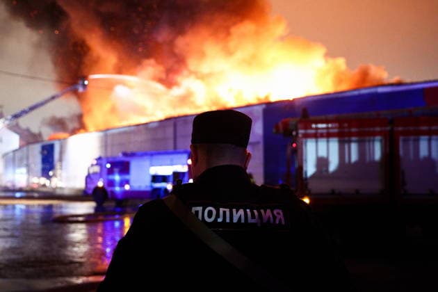 RUSSIA, MOSCOW - MAY 13, 2026: A police officer guards the area outside the Izmailovo Kremlin hit by fire. Sofya Sandurskaya TASS  92388754