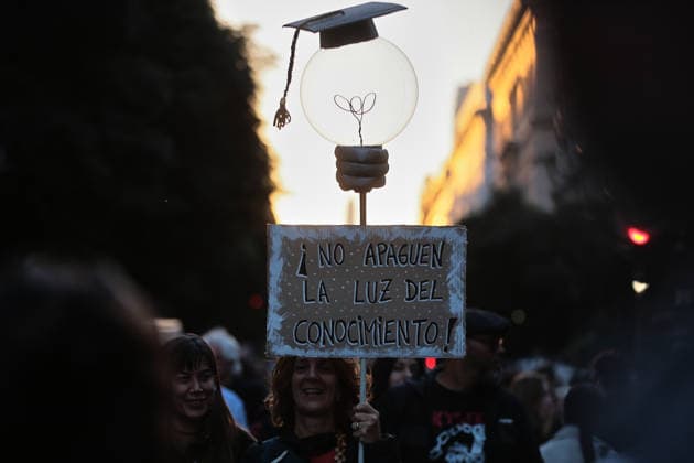 Nationwide march in defense of public university held in Buenos Aires BUENOS AIRES, ARGENTINA - MAY 12: A view of a banner as demonstrators carrying banners, flags, and signs demanding higher education funding and salary increases for professors and researchers march toward Plaza de Mayo during a nationwide demonstration, in Buenos Aires, Argentina, on May 12, 2026. Protesters demand the implementation of the University Funding Law, oppose budget cuts introduced by the government of Argentine President Javier Milei, and advocate for the protection of Argentina’s public university system amid the country’s economic crisis and austerity measures. Luciano Gonzalez Anadolu Buenos Aires Argentina. Editorial use only. Please get in touch for an  Copyright: x2026xAnadoluxLucianoxGonzalezx