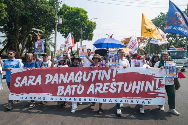 May 13, 2026, Pasay, Metro Manila, Philippines: Proteters from multiple sectors marched toward the Senate office to protest the slow impeachment of the Vice President and the evasion of arrest of the Senator. Pasay Philippines - ZUMAy102 20260513_zip_y102_003 Copyright: xKenosisxYapx