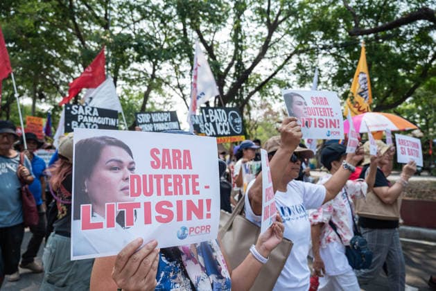 May 13, 2026, Pasay, Metro Manila, Philippines: Protesters hold up signs calling for the impeachment of the Vice President. Pasay Philippines - ZUMAy102 20260513_zip_y102_005 Copyright: xKenosisxYapx