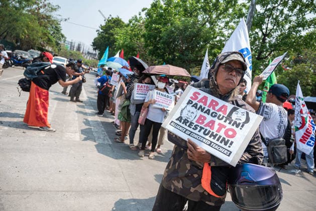 May 13, 2026, Pasay, Metro Manila, Philippines: Protesters call for the impeachment of Vice President Duterte and arrest of Senator Dela Rosa. Pasay Philippines - ZUMAy102 20260513_zip_y102_006 Copyright: xKenosisxYapx