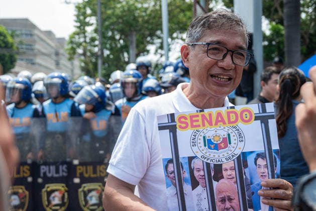 May 13, 2026, Pasay, Metro Manila, Philippines: Teddy CasioÂ±o speaks to the media as the protesters continue their program. Pasay Philippines - ZUMAy102 20260513_zip_y102_010 Copyright: xKenosisxYapx