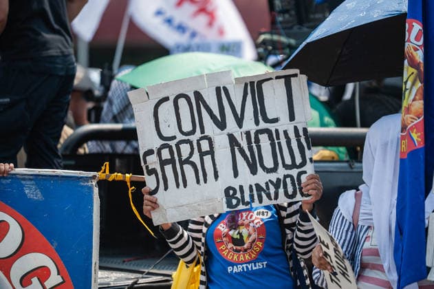 May 13, 2026, Pasay, Metro Manila, Philippines: A protester holds up a sign calling for the impeachment of the Vice President. Pasay Philippines - ZUMAy102 20260513_zip_y102_020 Copyright: xKenosisxYapx