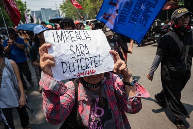 May 13, 2026, Pasay, Metro Manila, Philippines: A protester holds up a sign calling for the impeachment of the Vice President. Pasay Philippines - ZUMAy102 20260513_zip_y102_021 Copyright: xKenosisxYapx