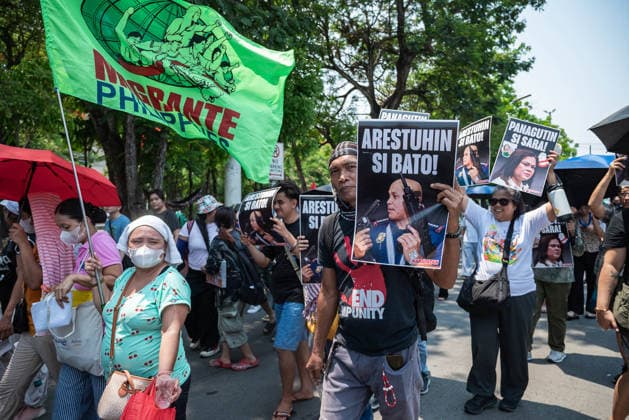 May 13, 2026, Pasay, Metro Manila, Philippines: Protesters carry placards and signs calling for the arrest of Senator Dela Rosa and the arrest of Vice President Duterte. Pasay Philippines - ZUMAy102 20260513_zip_y102_022 Copyright: xKenosisxYapx
