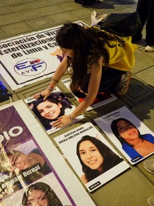 May 12, 2026, Lima, Lima, Peru: Photographs of femicide victims are placed on the floor when a group of women protest in front of the judiciary the serious threat to women s rights posed by recent congressional bills that seek to eliminate in Peru the crime of femicide and also threatens female victims who report violence. Lima Peru - ZUMAg240 20260512_zip_g240_004 Copyright: xCarlosxGarciaxGranthonx