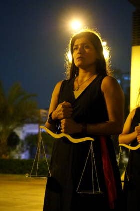 May 12, 2026, Lima, Lima, Peru: Women dressed in black, carrying a scale, and representing justice demonstrating when a group of activists protest in front of the judiciary the serious threat to women s rights posed by recent congressional bills that seek to eliminate in Peru the crime of femicide and also threatens female victims who report violence. Lima Peru - ZUMAg240 20260512_zip_g240_016 Copyright: xCarlosxGarciaxGranthonx