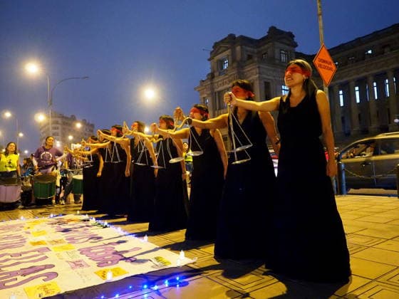 May 12, 2026, Lima, Lima, Peru: Women dressed in black, carrying a scale, and representing justice demonstrating when a group of activists protest in front of the judiciary the serious threat to women s rights posed by recent congressional bills that seek to eliminate in Peru the crime of femicide and also threatens female victims who report violence. Lima Peru - ZUMAg240 20260512_zip_g240_018 Copyright: xCarlosxGarciaxGranthonx